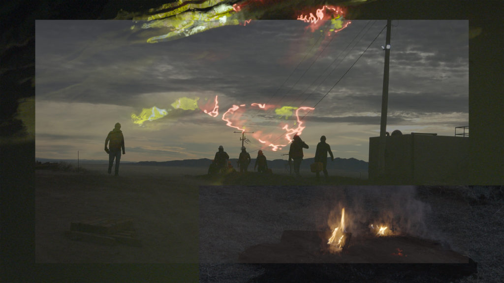 silhouettes of people working on a construction site, sun setting in the background